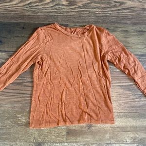 long orange/brown shirt